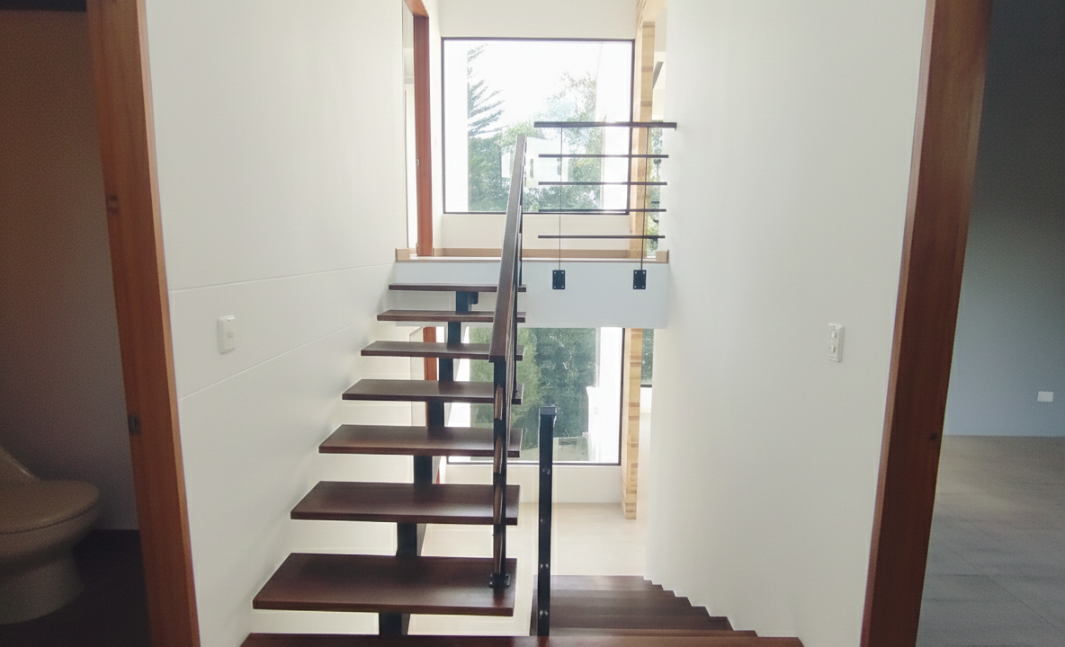 Escaleras casa los angeles del bosque